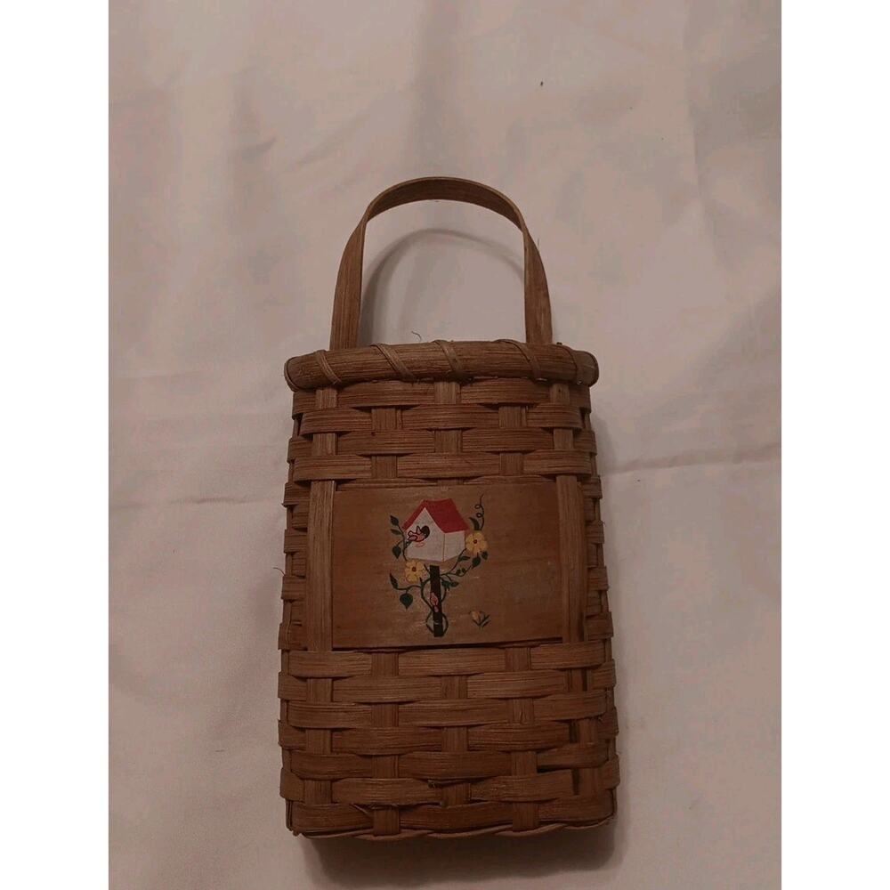 Woven basket with handle,for birding binocular storage.